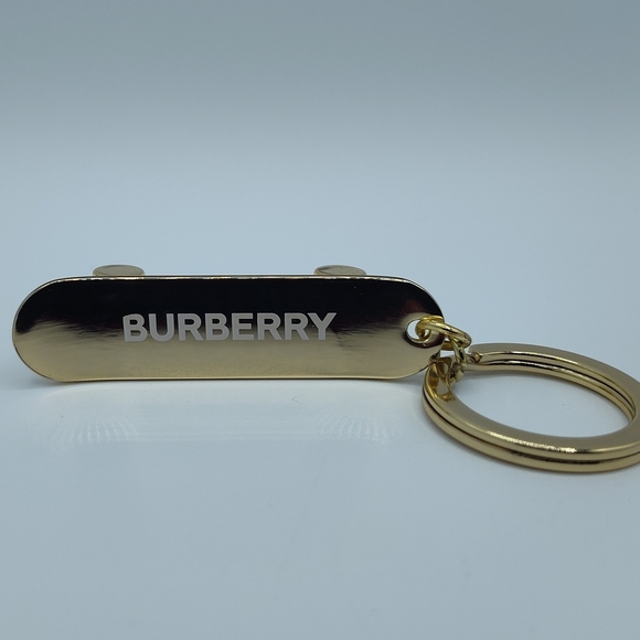 Burberry Accessories - Burberry HER Gold Skateboard Keychain 2019 Limited Edition Rolling GWP NIP